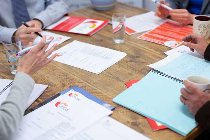 case manager sitting on stairs