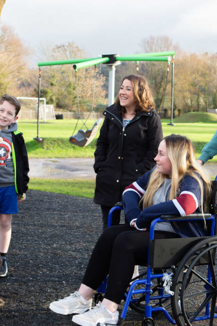 case management team meeting with young wheelchair user